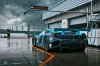 mclaren-mp4-12c-gt3-von-ryan-racing-a-wet-track-clouds.jpg